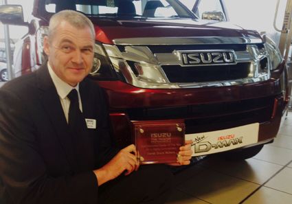 Derek Slack Motors receive Isuzu award.