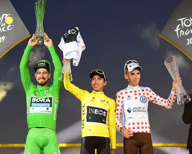 Tour de France winner Egan Bernal celebrates with crystal trophy from ŠKODA AUTO